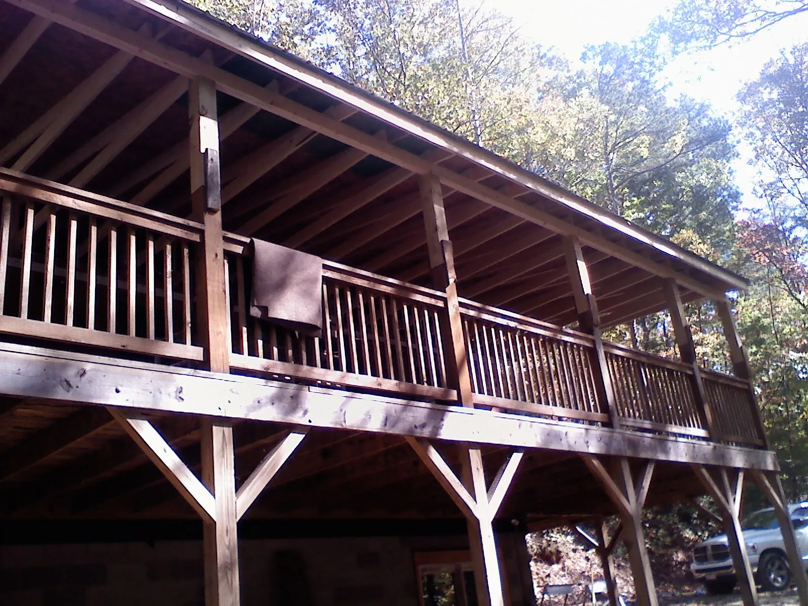 Timber framing under a new elevated porch and deck — Roof Leak Repair in Devers by Roofing Brothers